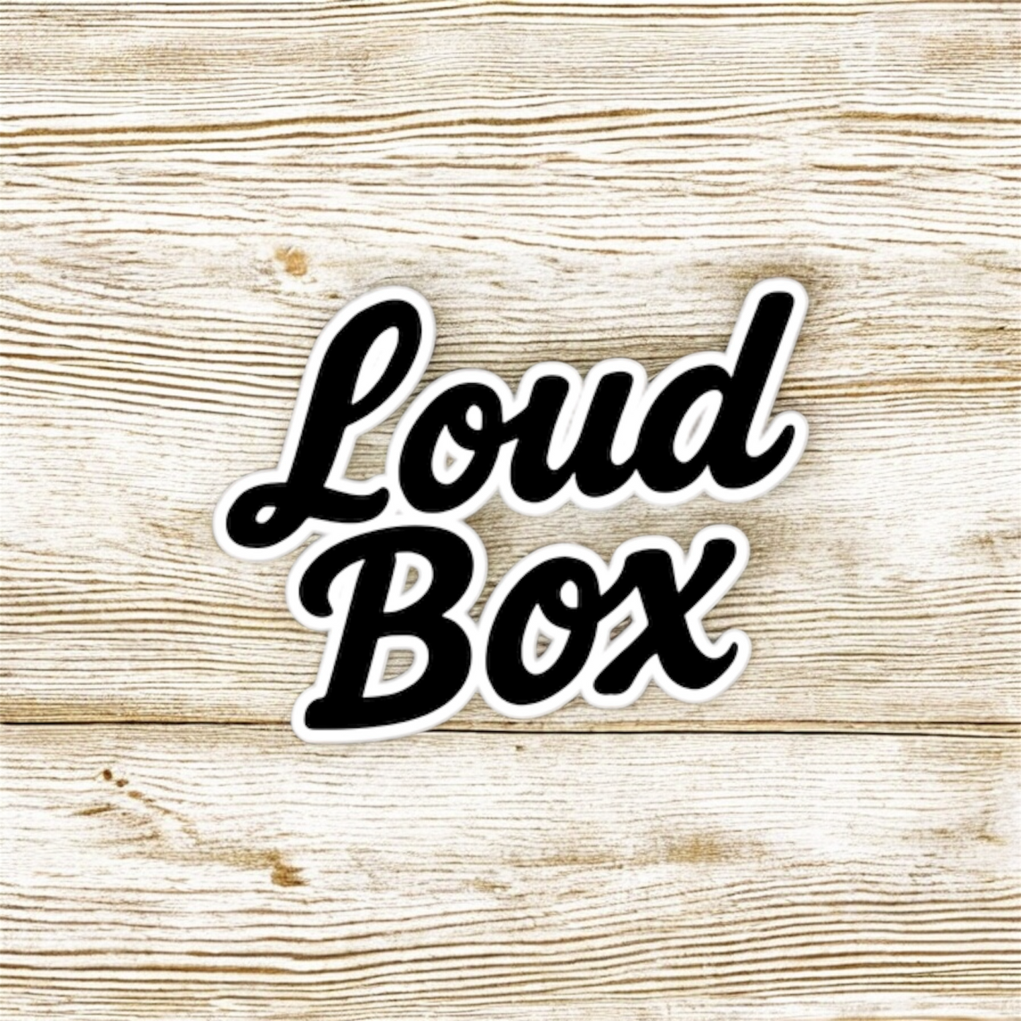 A stunning Loudbox Logo on Light Brown wood
